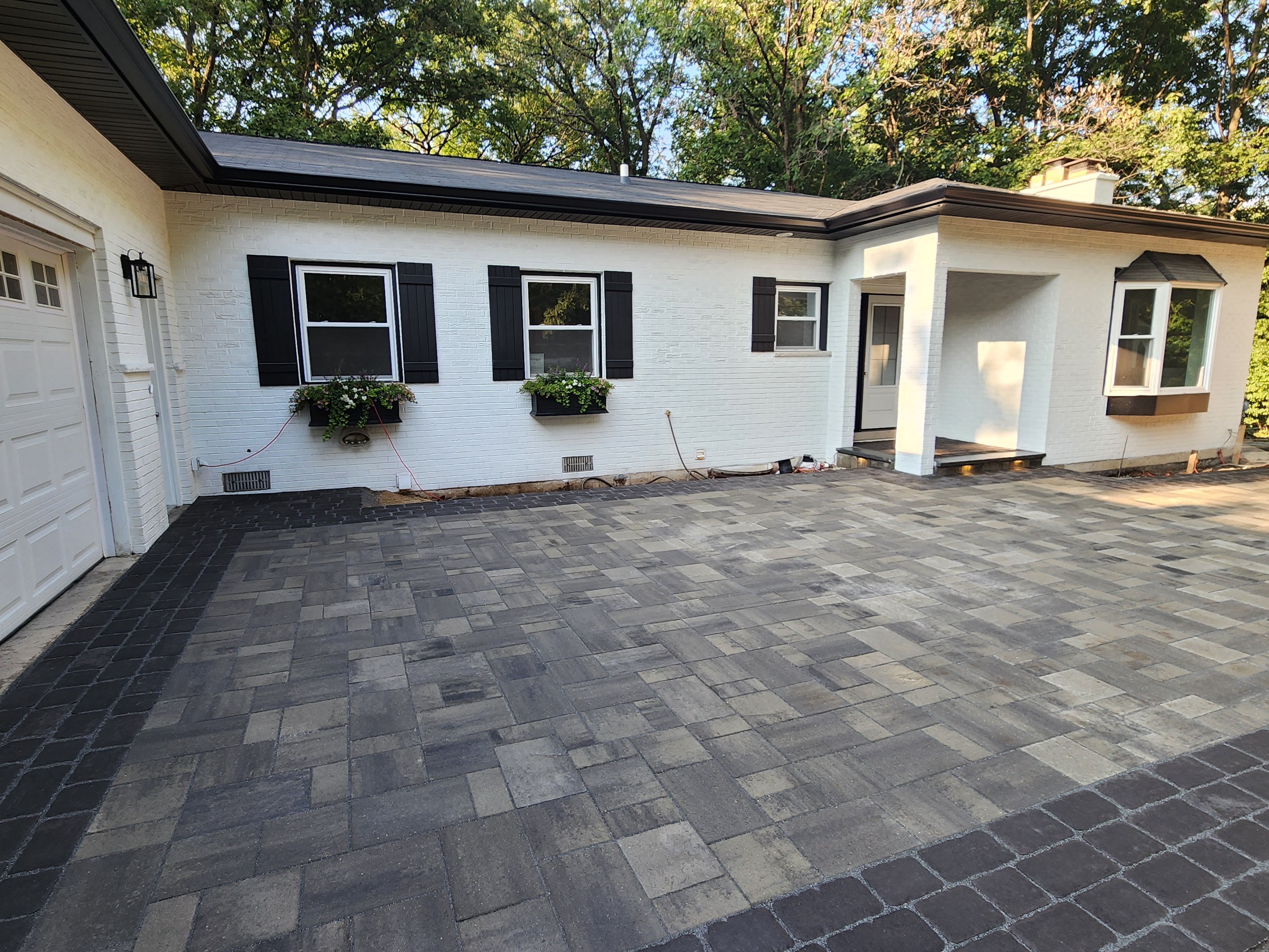 Large paver patio installation